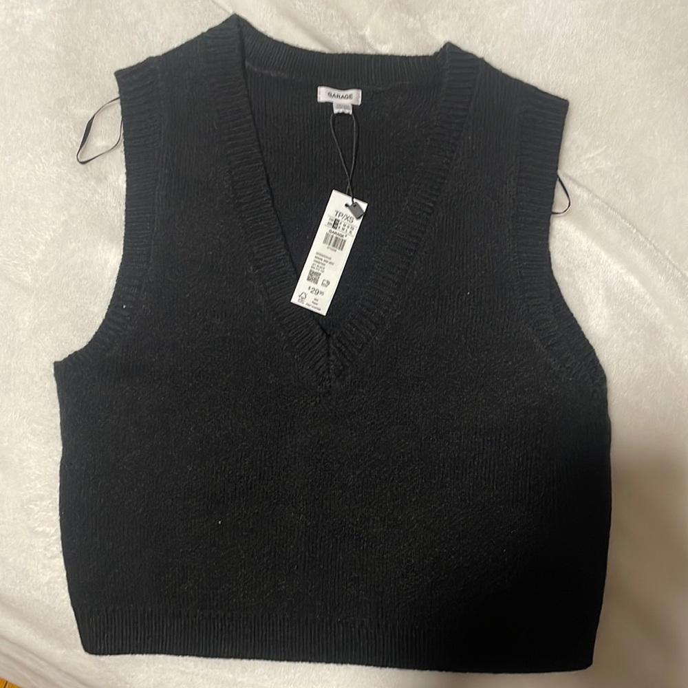 Black sweater vest
